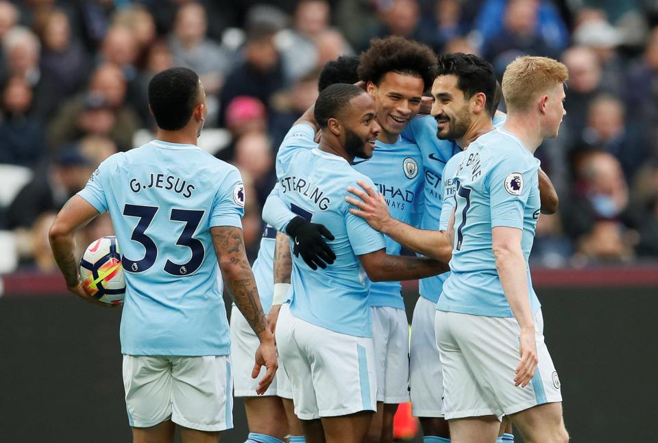 Man City celebrate going a goal up early-on at the London Stadium