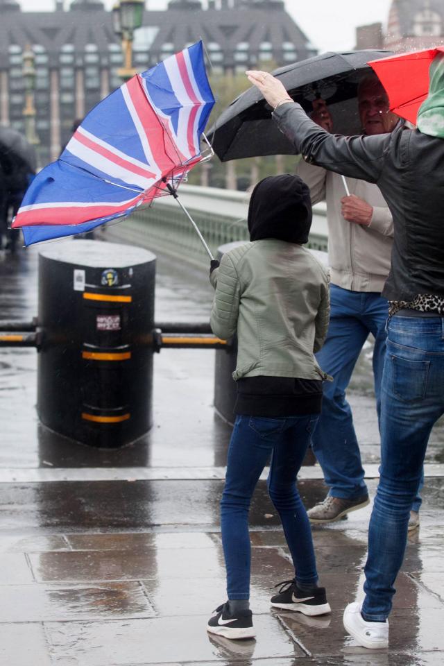  A Union Jack is turned inside out by the strong winds