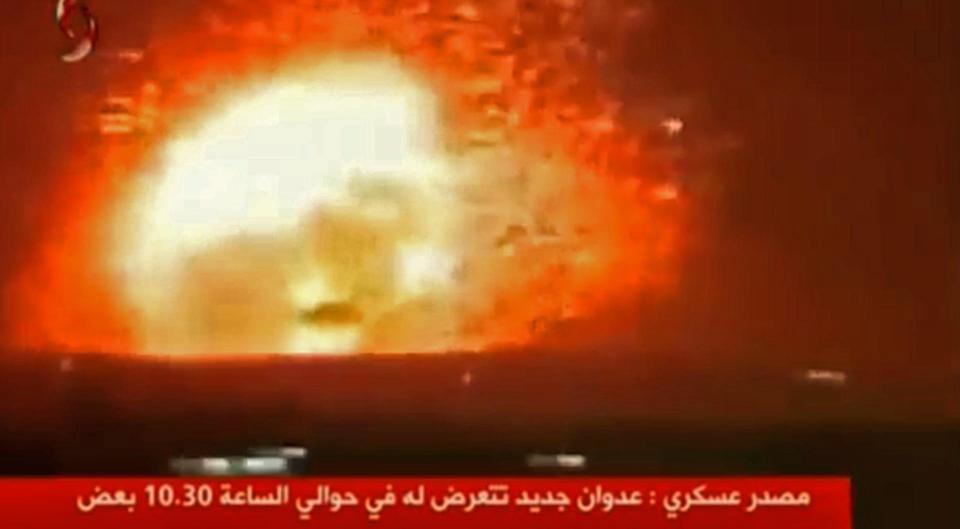  An image grab taken from the Syrian TV channel, Al-Ekhbariya Al-Souriya, allegedly showing the scene of the huge missile attacks last night