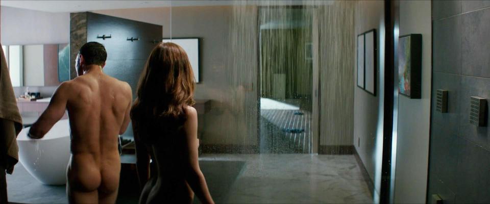  Christian Grey and Anastasia head to the bathroom in the latest flick