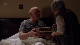  Phelan was seen propped up in bed in a B&B