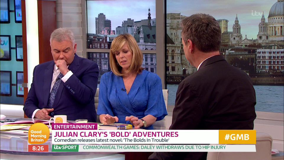  Eamonn tried to suppress his coughs as Kate Garraway spoke to Julian about his new book