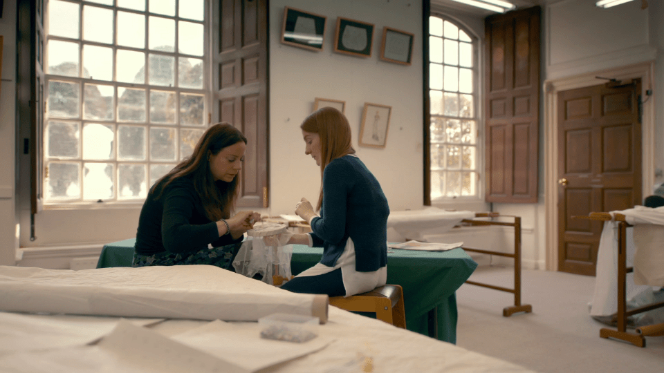 Artists working on the lace for Kate’s dress