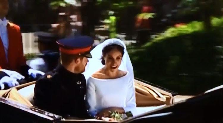  Meghan seemed overcome with emotion as the carriage drove through the streets of Windsor with Harry