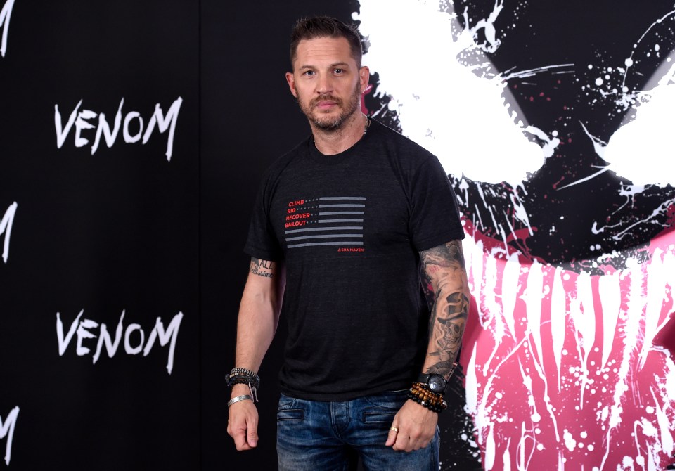  Tom Hardy attends a photo call for Venom in 2018, Los Angeles, US