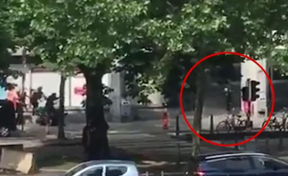  The attacker, circled, was shot by police