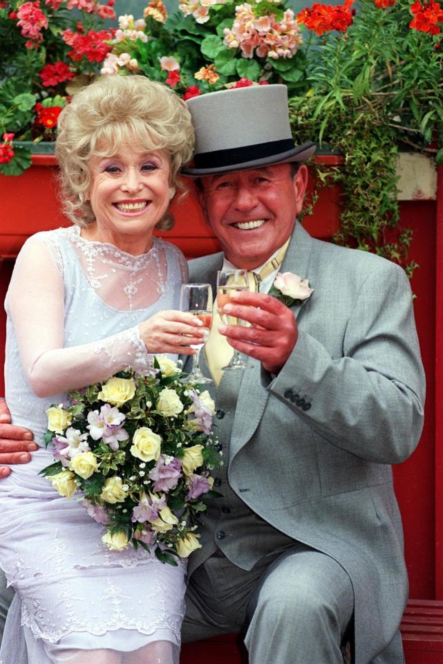  The 80-year-old, here with her late co-star Mike Reid, on the set of EastEnders