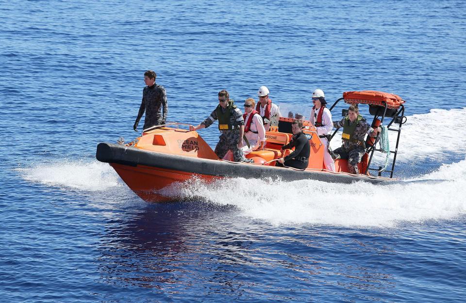  Navy personnel searching the ocean for debris of MH370 in the southern Indian Ocean