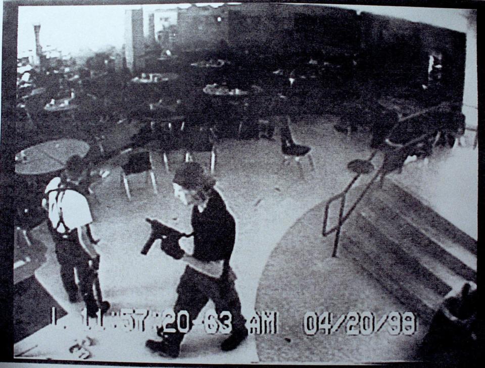  Columbine shooters Eric Harris, left and Dylan Klebold appear in this CCTV still of footage shot in the school cafeteria