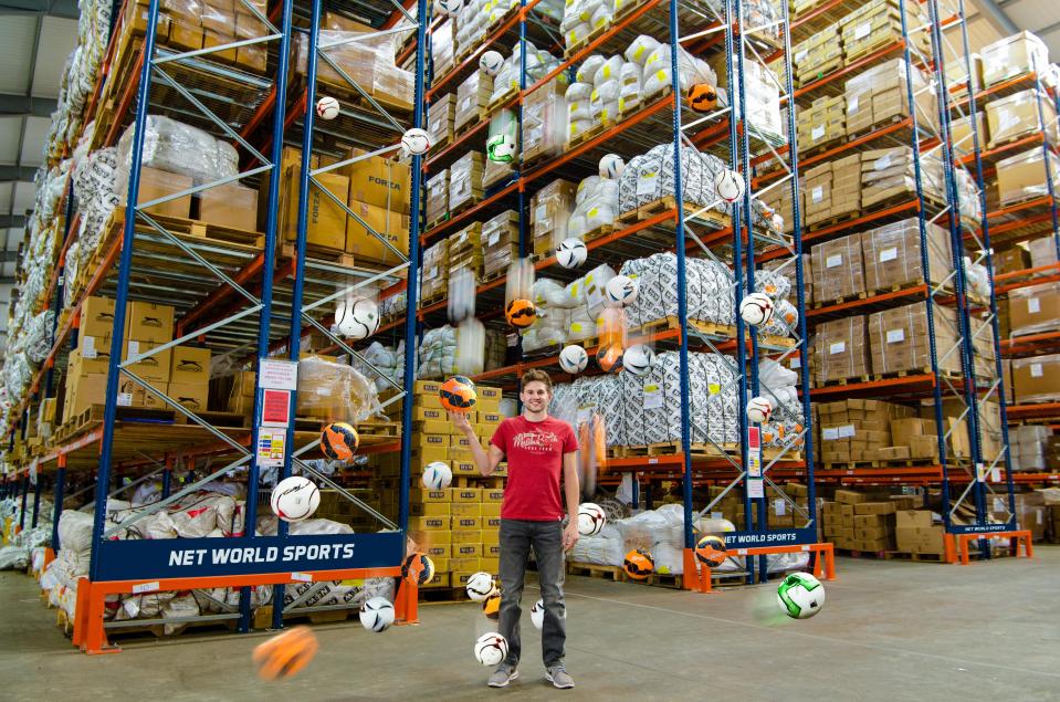  Alex Loven in his warehouse - he's worth a whopping £55million