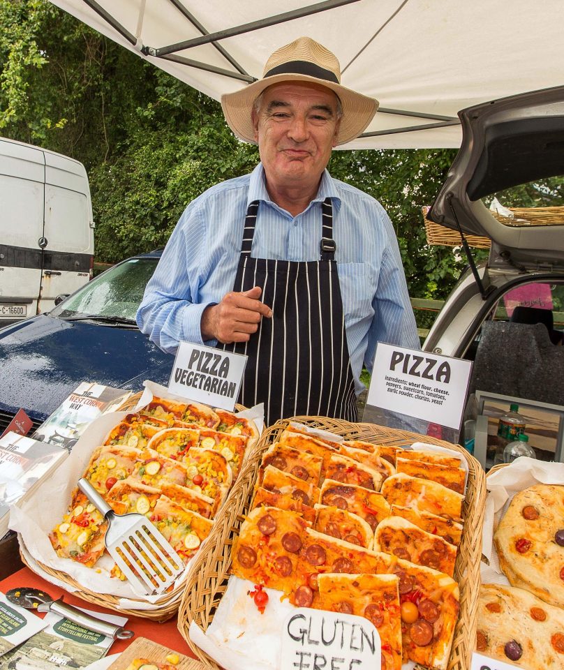  Poet and journalist Ian Bailey smiles at his pizza stall last year