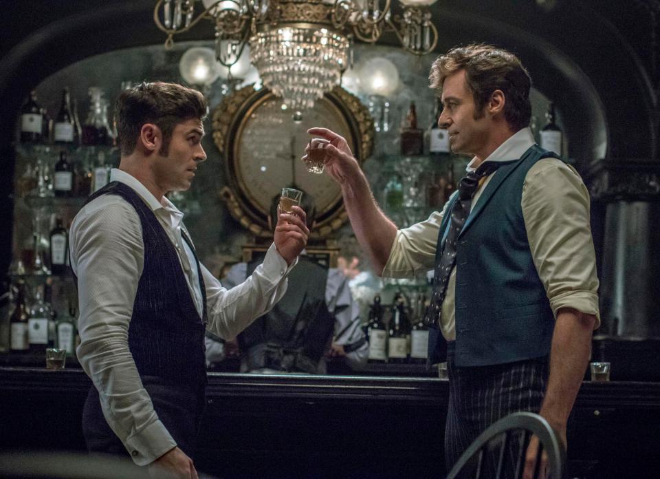  Zac Efron, left and Hugh Jackman both star in The Greatest Showman in an all-star cast