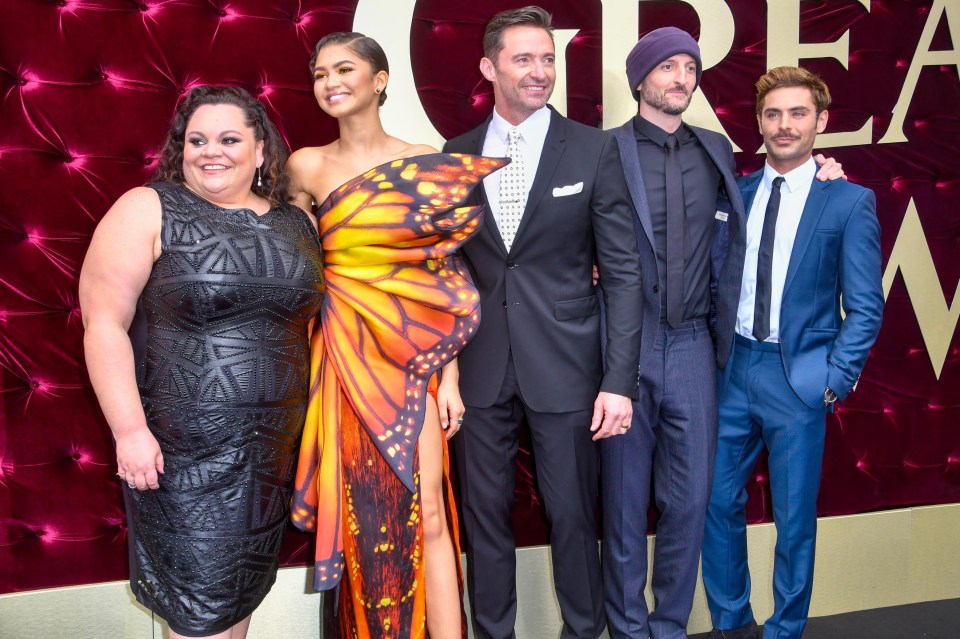 Keala Settle, Zendaya, Hugh Jackman, Michael Gracey and Zac Efron all star in the movie