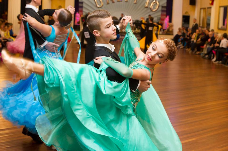  Young dancers take to the dancefloor at a ballroom competition