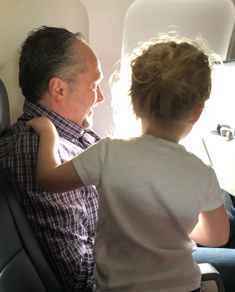  During the flight, he coloured and watched a movie with Caroline, he engaged in conversation and showed her all the things outside