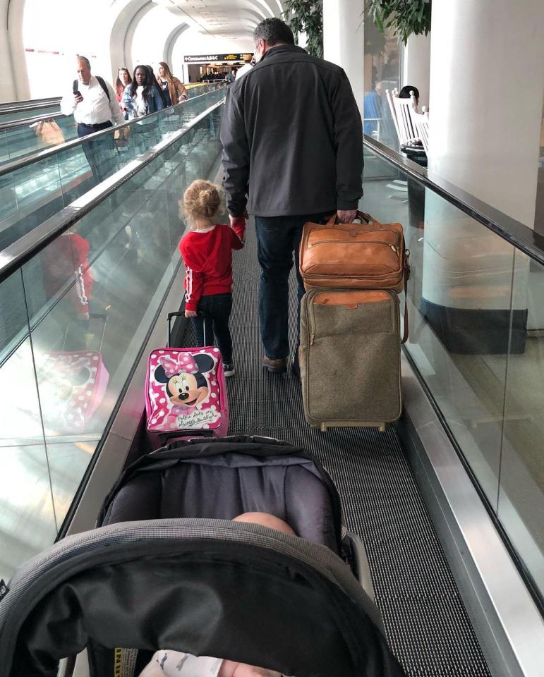  After the plane landed, the man even escorted the family to their connecting flight