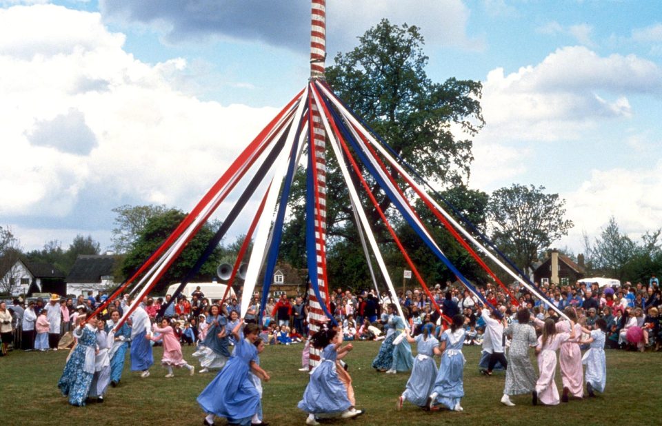  People commonly dance around a maypole