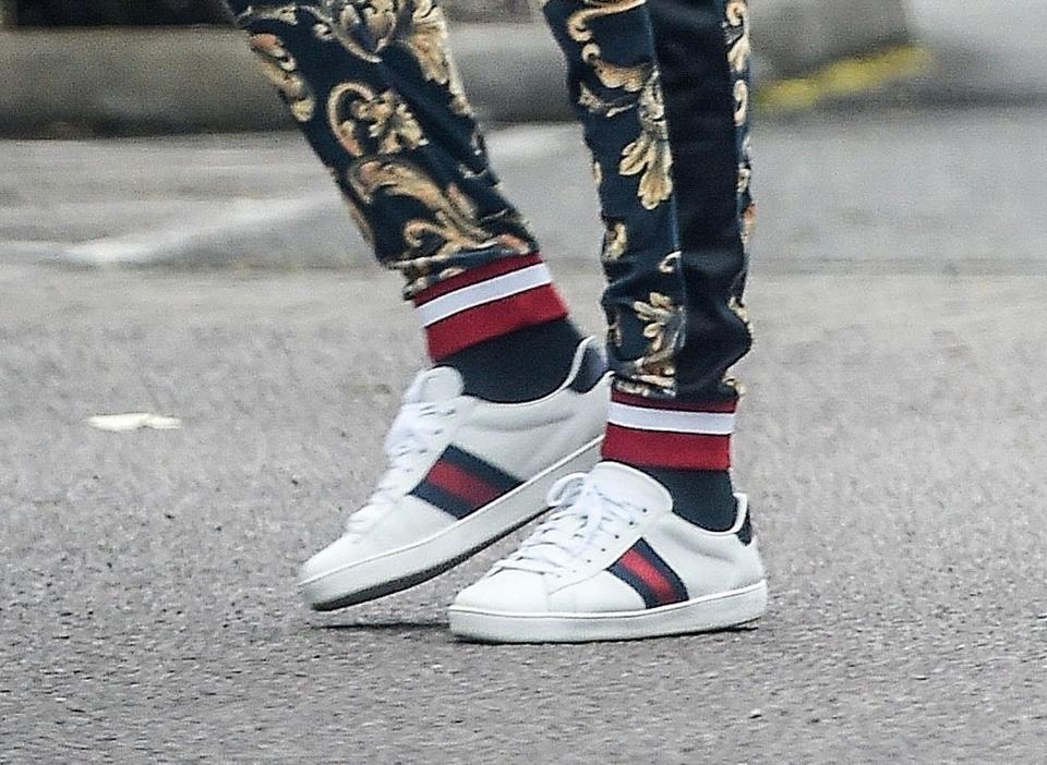  He topped it off with a pair of Gucci trainers worth £445