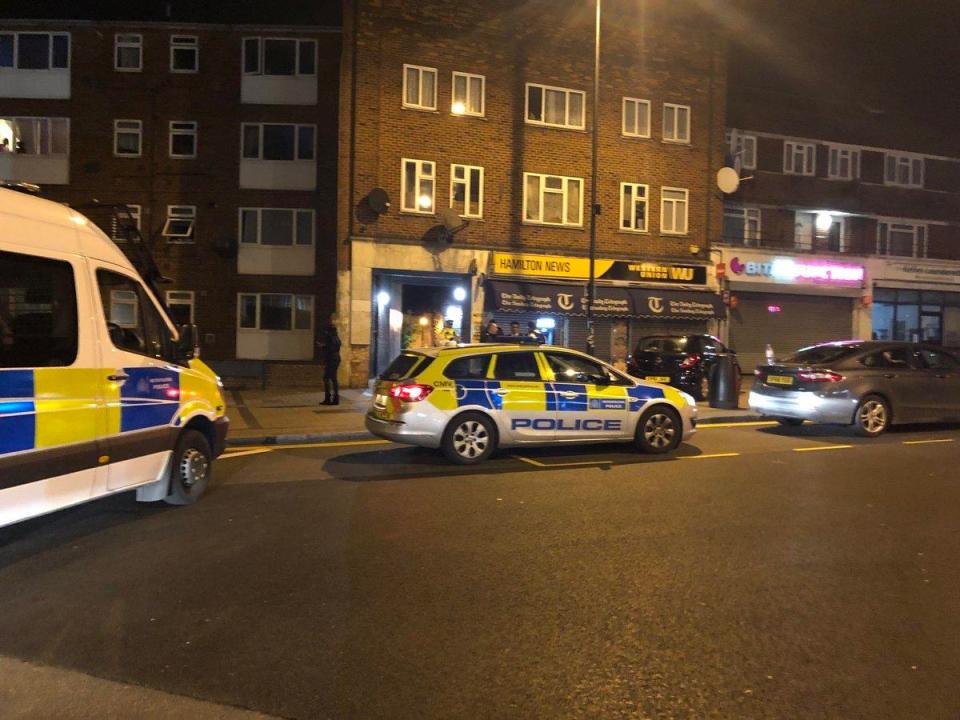 The scene outside Queensbury tube station on Cumberland Road in North West London 