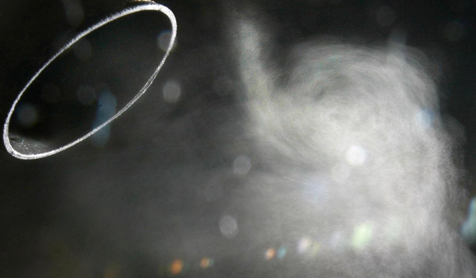  Fine air particles pictured billowing out of car exhaust emissions