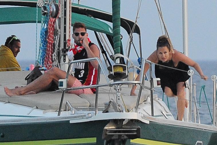 Caroline Flack and her new fiance Andrew Brady enjoyed a sunset cruise while on holiday in Santorini