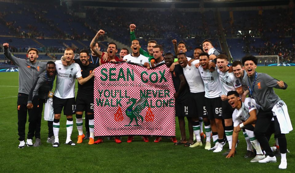  Liverpool's players celebrate qualifying for the Champions League final and pay tribute to attacked fan Sean Cox who has been in a coma since last week