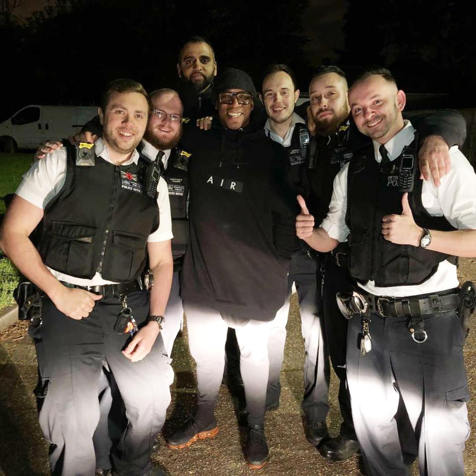  Six officers pose with Ian Wright