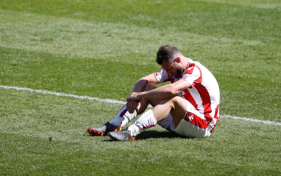  Stoke left-back Erik Pieters looks dejected after Stoke were relegated from the Premier League