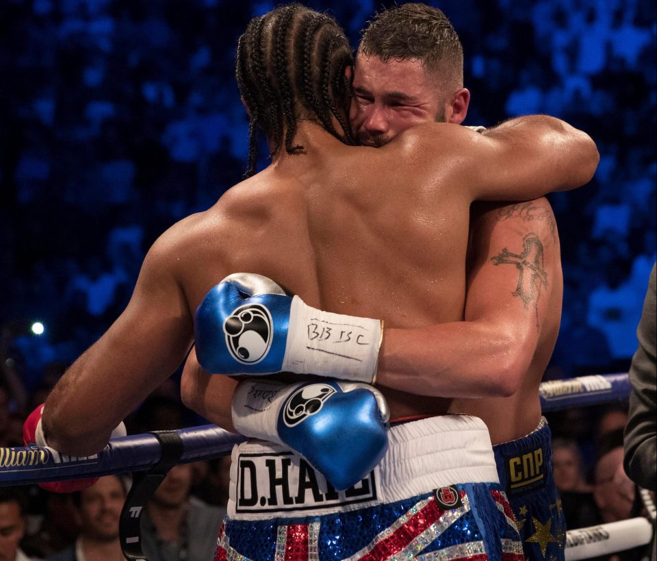  The two fighters embrace after their latest war in London