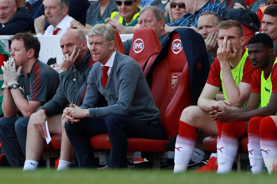  The boss takes his place in the Emirates dugout for the last time