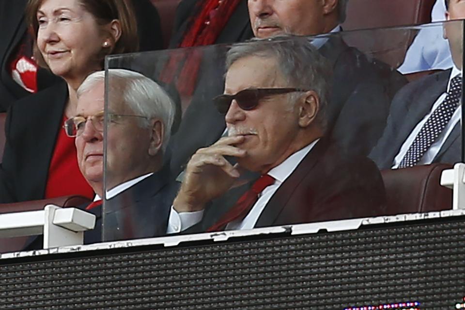  Sunglass-wearing Stan Kroenke is not popular with some Arsenal fans