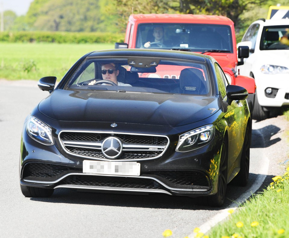 Manchester United defender Victor Lindelof drives his Mercedes to training