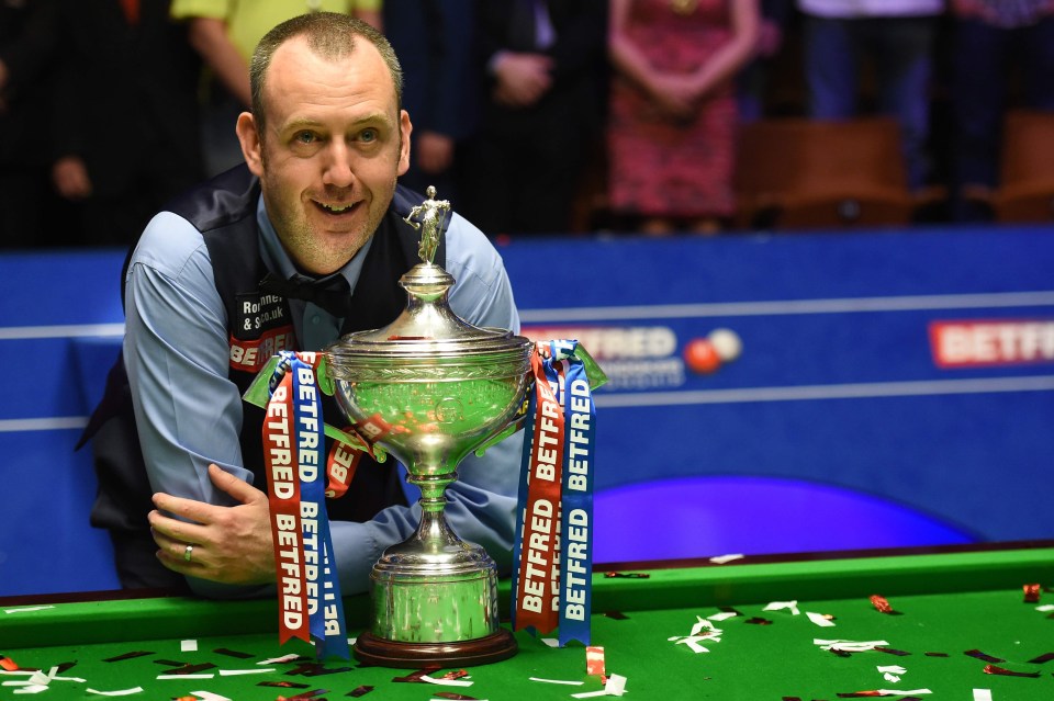 Mark Williams with his prize after winning the World Snooker Championship