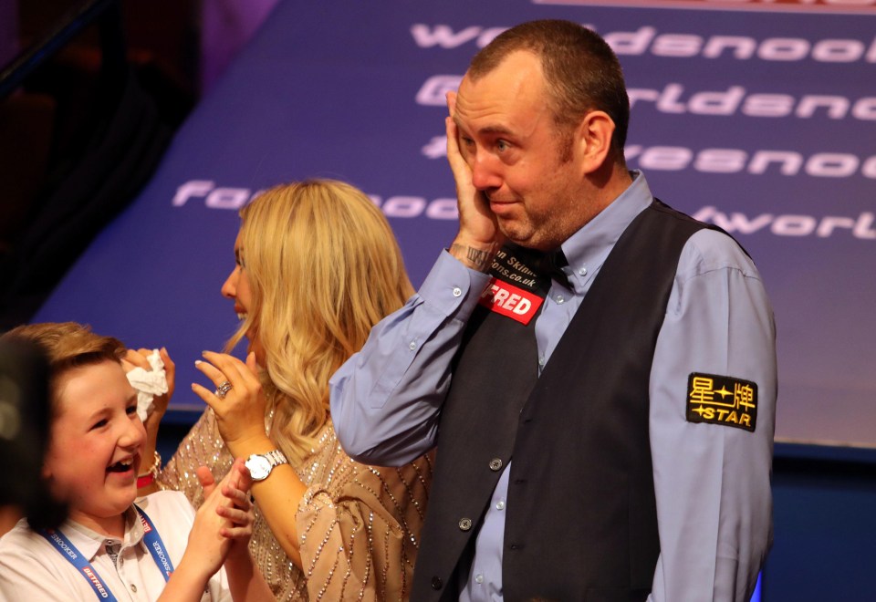 Mark Williams sheds a tear after winning his third world title