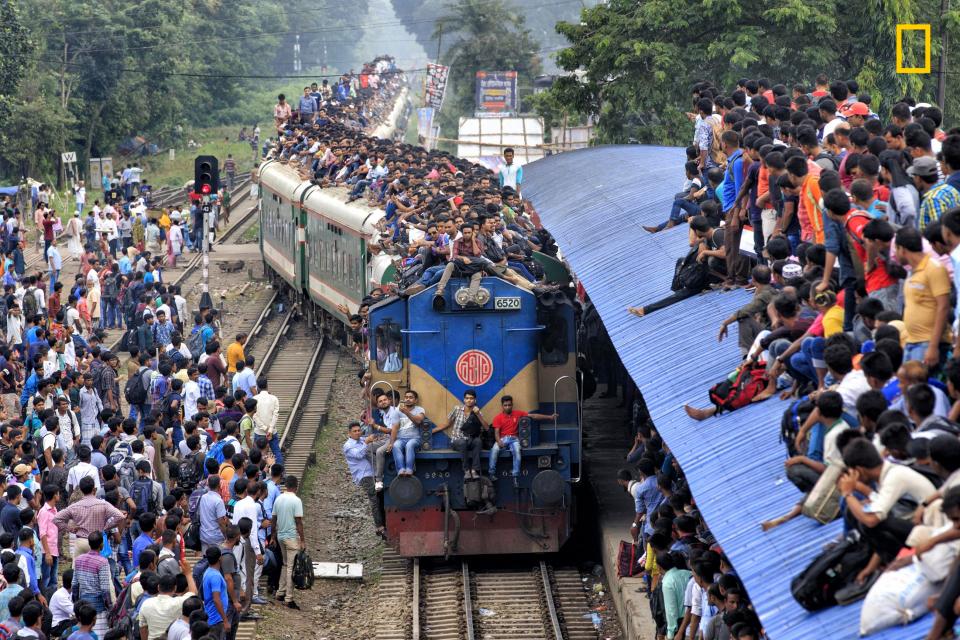  Hundreds of people, travelling to worship at the Muslim festival Eid-ul Adha, cram on top of a train in Bangladesh. The stunningly dangerous commute was captured by Yousuf Tushar