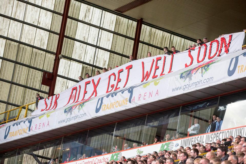 Aberdeen fans unfurled a giant banner wishing their former boss a speedy recovery