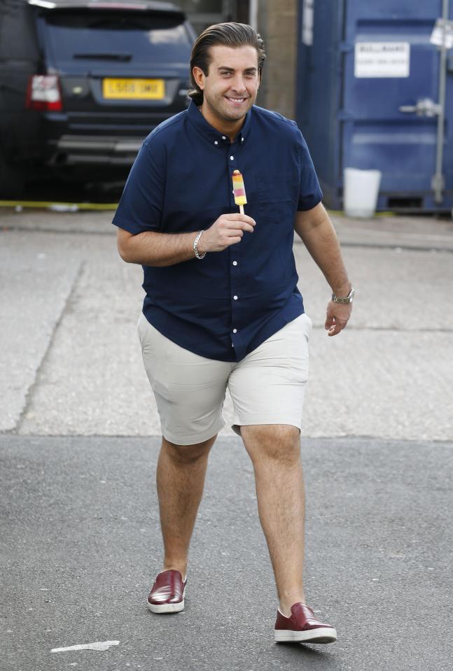  Arg dressed for the sun in a navy shirt and cream shorts