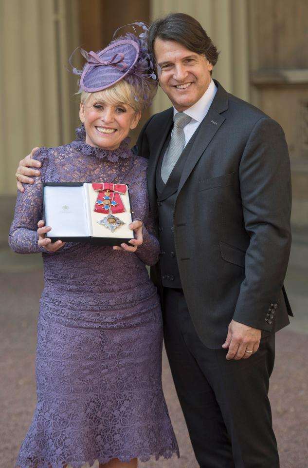  Dame Barbara Windsor at Buckingham Palace with husband Scott in 2016 after being made a Dame