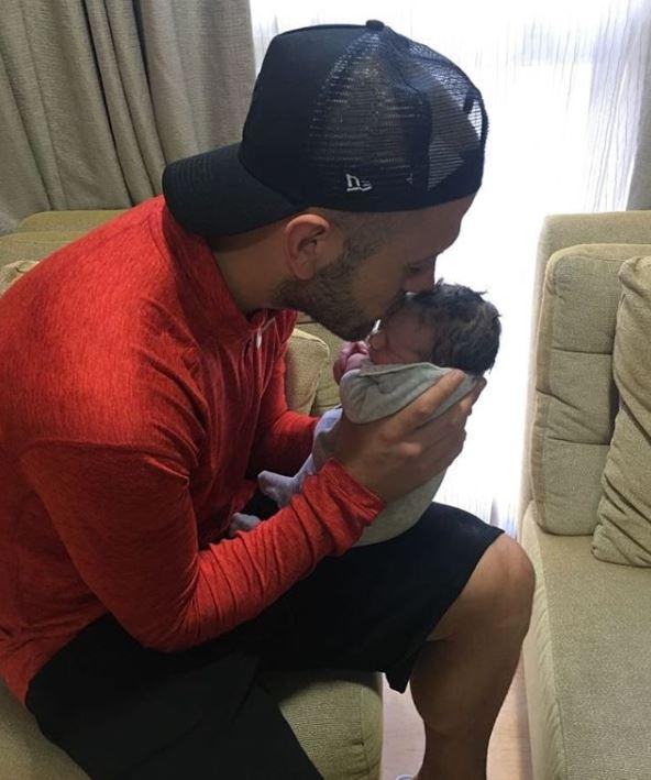  The Arsenal star with his third child