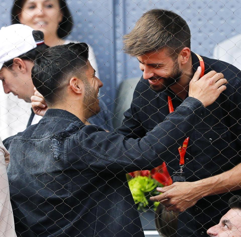 Gerard Pique met Marco Asensio at the Madrid Masters on Friday