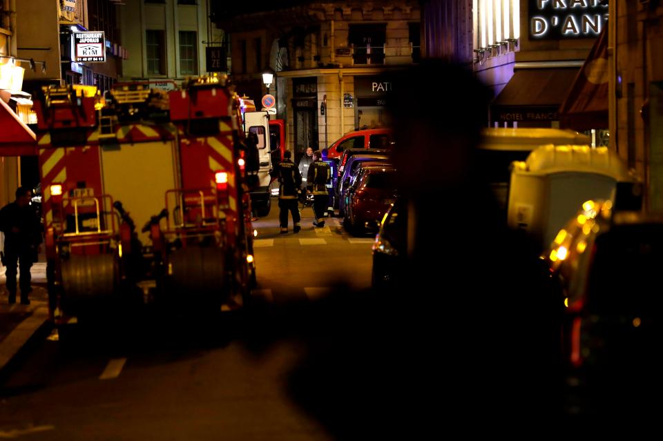  Police stand guard after one person was killed and several injured in a knife attack