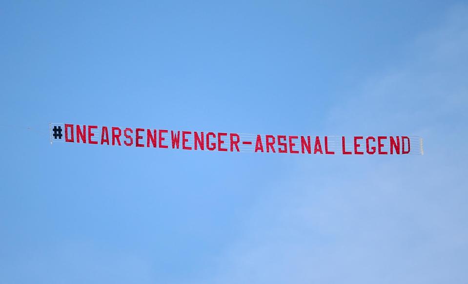  Arsenal fans flew a banner over Huddersfield in honour of Arsene Wenger