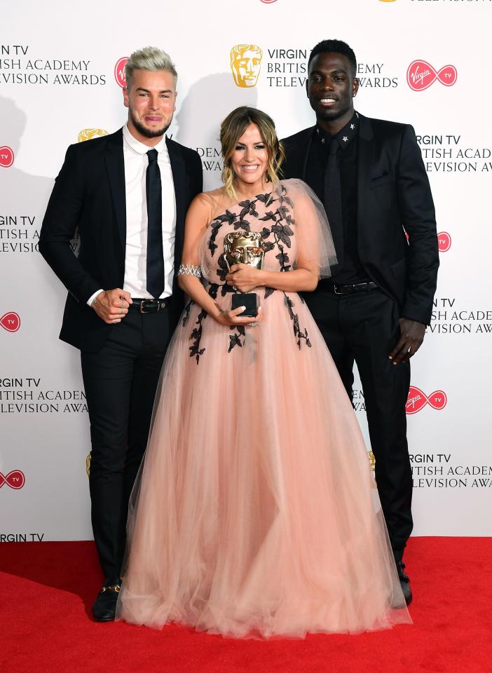  Chris Hughes and Marcel Somerville joined Caroline for a backstage snap with the award