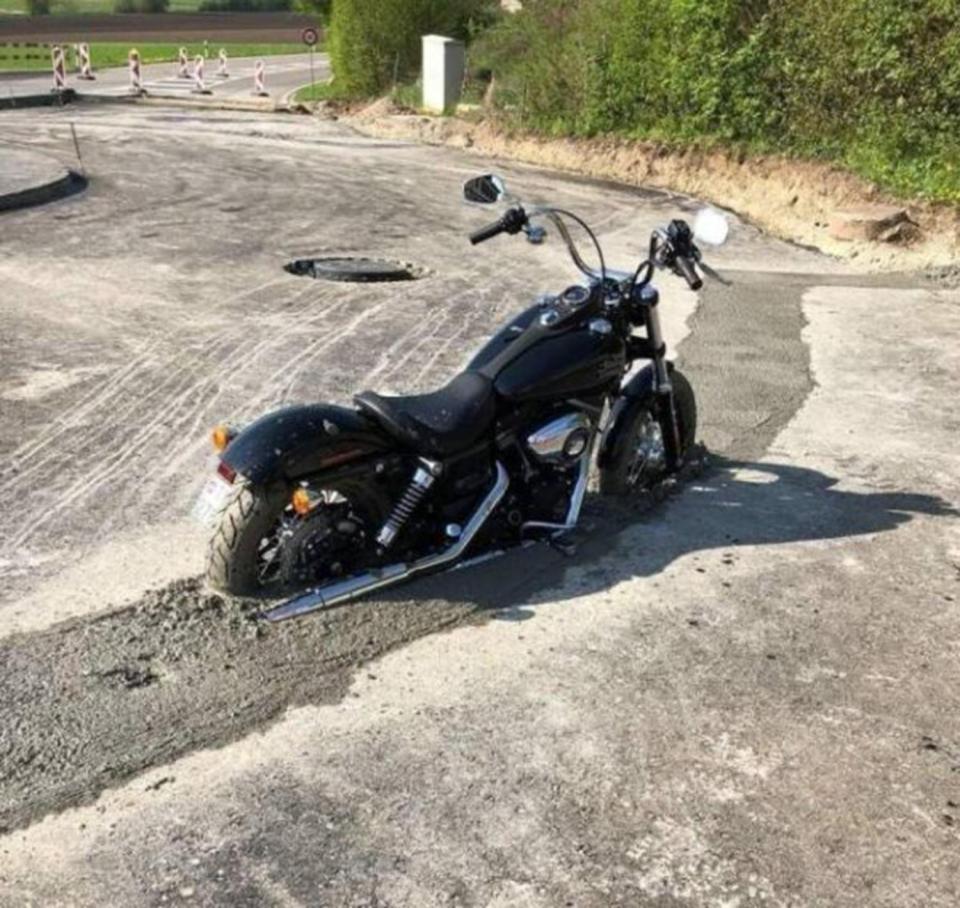  This road just acquired a motorbike statue