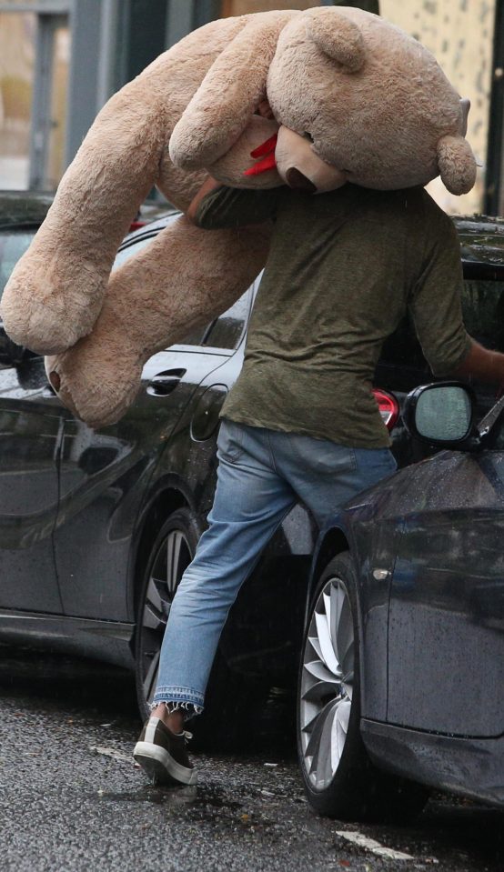  Towie star Jake was hands on with the removals - and even lugged in this enormous teddy