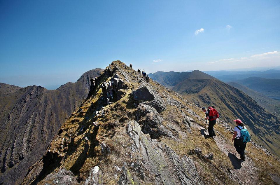  Entrepid climbers scale Caher Ridge in the Reeks District in Ireland