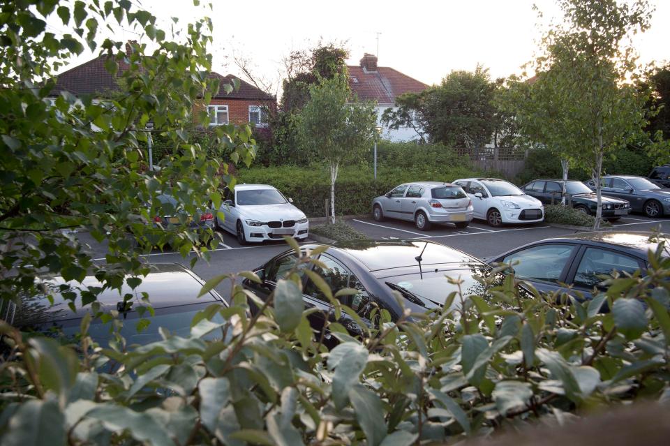 The wasteland behind is now a car park for a nearby block of flats