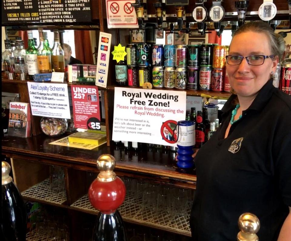  Signs in the pub warn customers about the ban