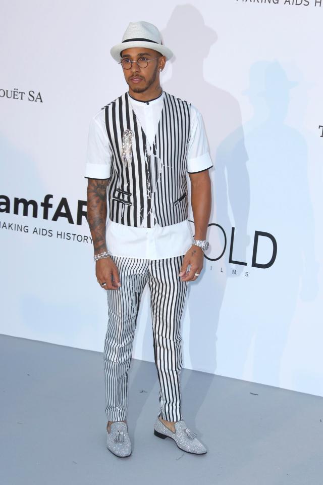  Lewis Hamilton made an appearance at the event, in a striped waist coat and trousers combo