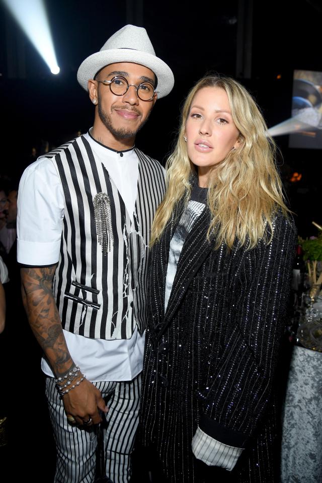  Lewis and singer Ellie Goulding started a few tongues wagging at the party